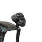 Aged-Blue-Metal-Decorative-Cyclist-Close-Up.jpg