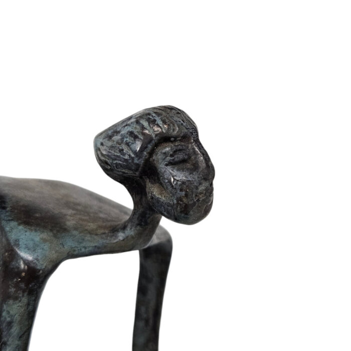 Aged-Blue-Metal-Decorative-Cyclist-Close-Up.jpg