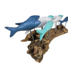 Blues-Fish-Swimming-On-Driftwood-Close-Up.jpg