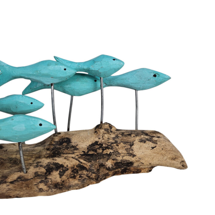 Carved-Wooden-School-Of-Fish-On-Driftwood-Blue-Close-Up.jpg