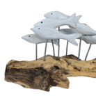 Carved-Wooden-School-Of-Fish-On-Driftwood-Close-Up.jpg