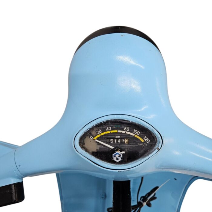 Blue Scooter Bar Counter Close Up Image