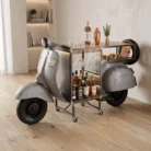 Grey vintage scooter bar counter styled in a home bar