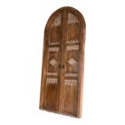 Arched teak door partition with doors open